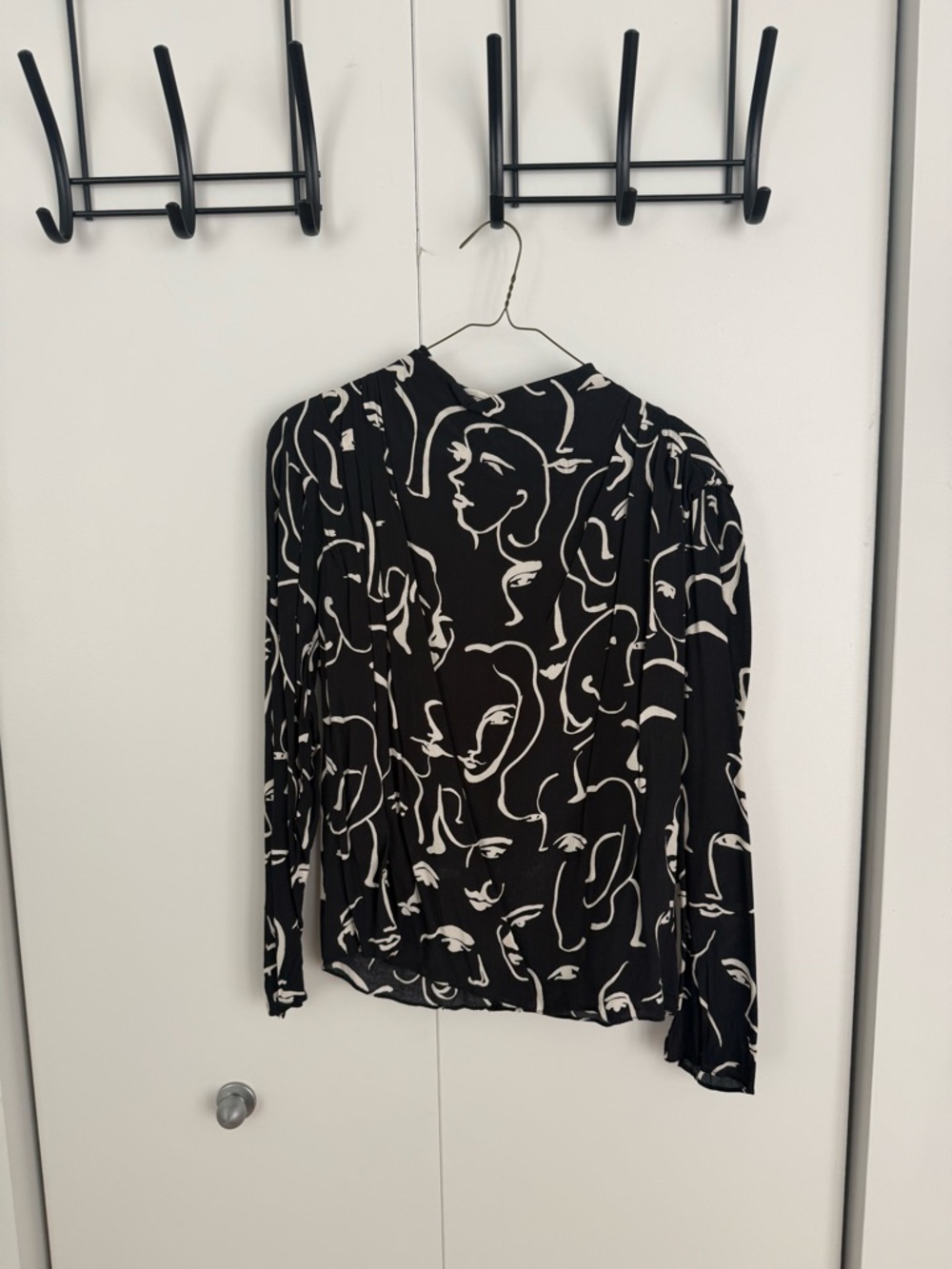 Zara Black Long-Sleeve Top with White Abstract Face Print